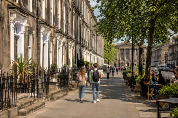 Students walking through Liverpool Georgian Quarter near historic buildings and cafes, showing a quiet student area close to city centre accommodation.